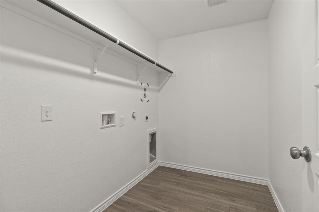 10024 Freighter Trail Fort Worth, TX 76131 - Photo 6 of 14 a view of a room with wooden floor