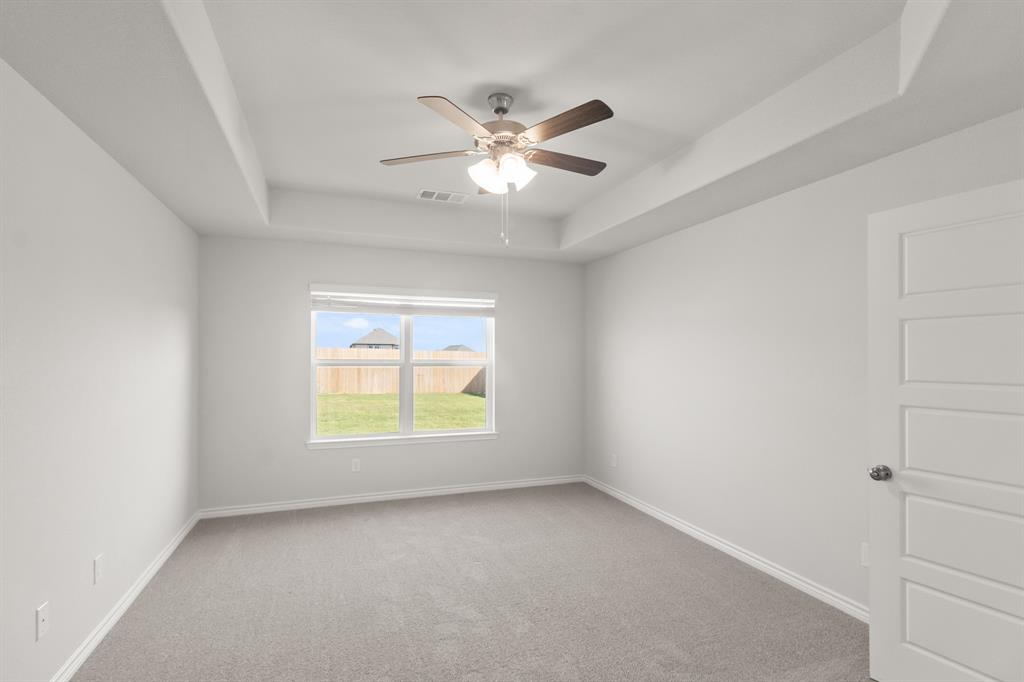 10024 Freighter Trail Fort Worth, TX 76131 - Photo 7 of 14 a view of an empty room with a window