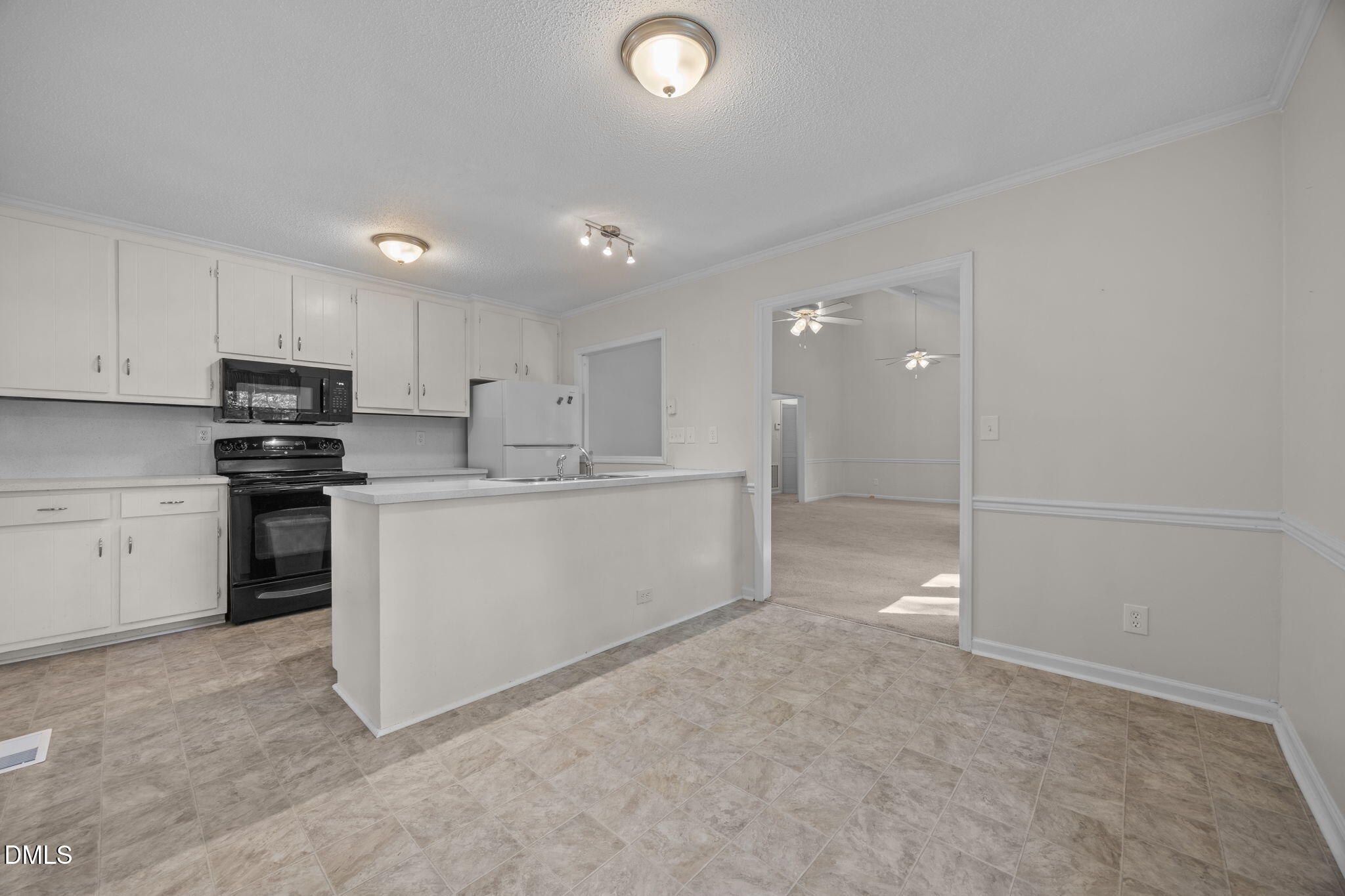 904 Snow Hill Road Durham, NC 27712 - Photo 20 of 41 a view of a kitchen with electric appliances