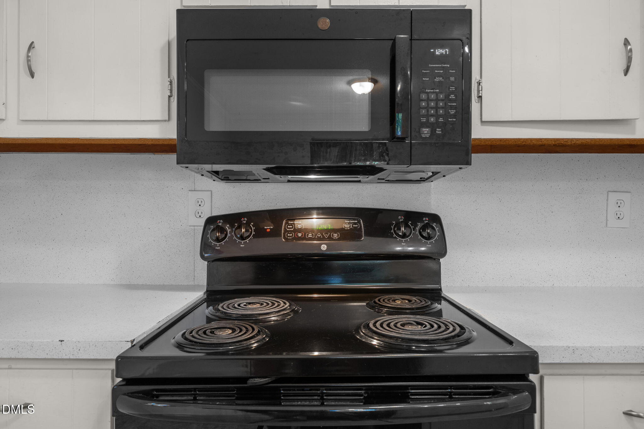 904 Snow Hill Road Durham, NC 27712 - Photo 23 of 41 a stove top oven sitting inside of a kitchen