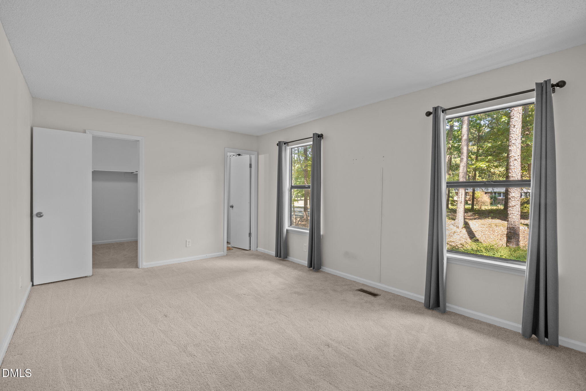 904 Snow Hill Road Durham, NC 27712 - Photo 27 of 41 a view of an empty room with a window