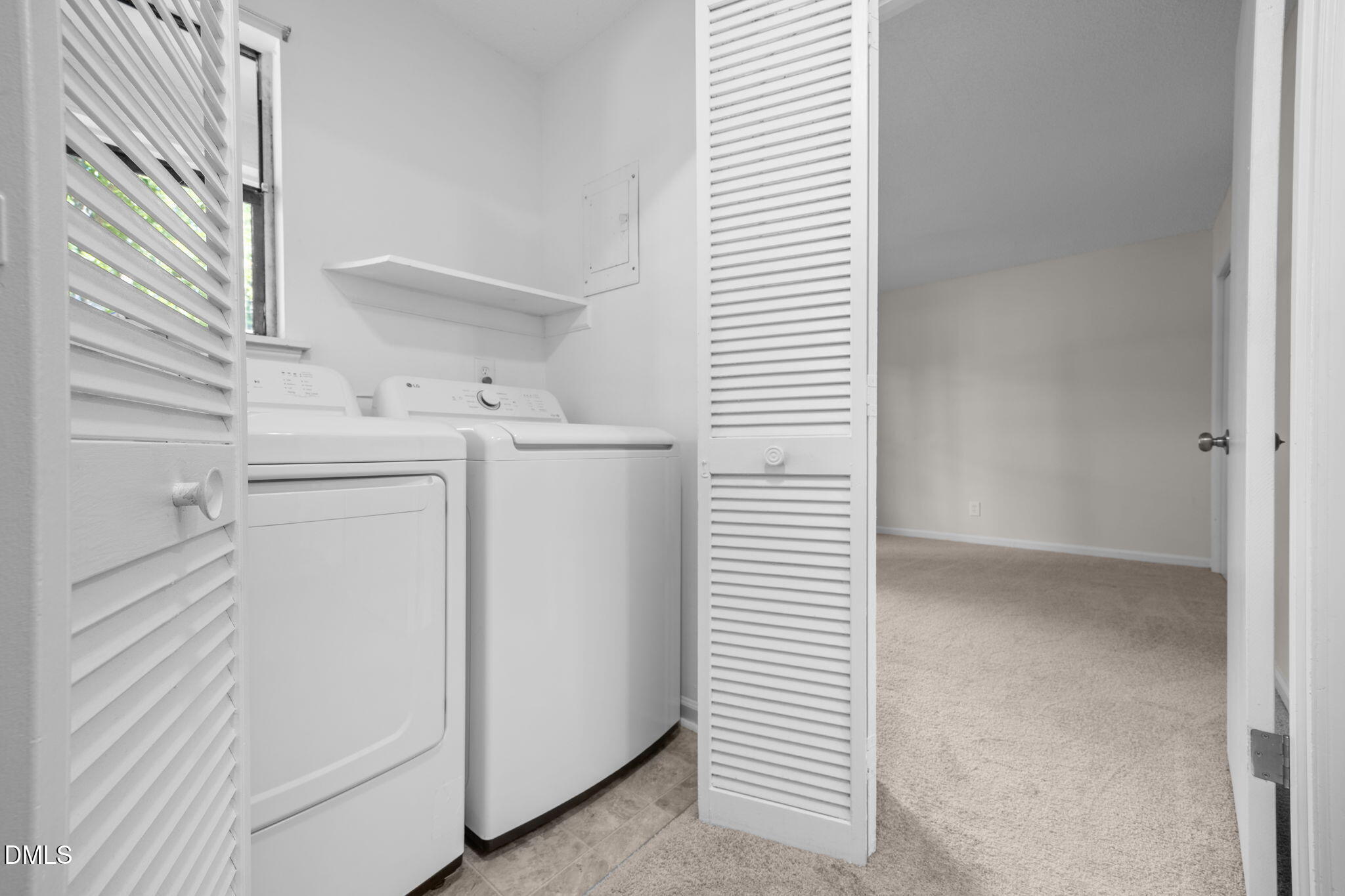 904 Snow Hill Road Durham, NC 27712 - Photo 31 of 41 a utility room with dryer and washer