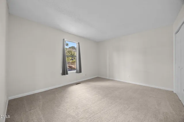 an empty room with window