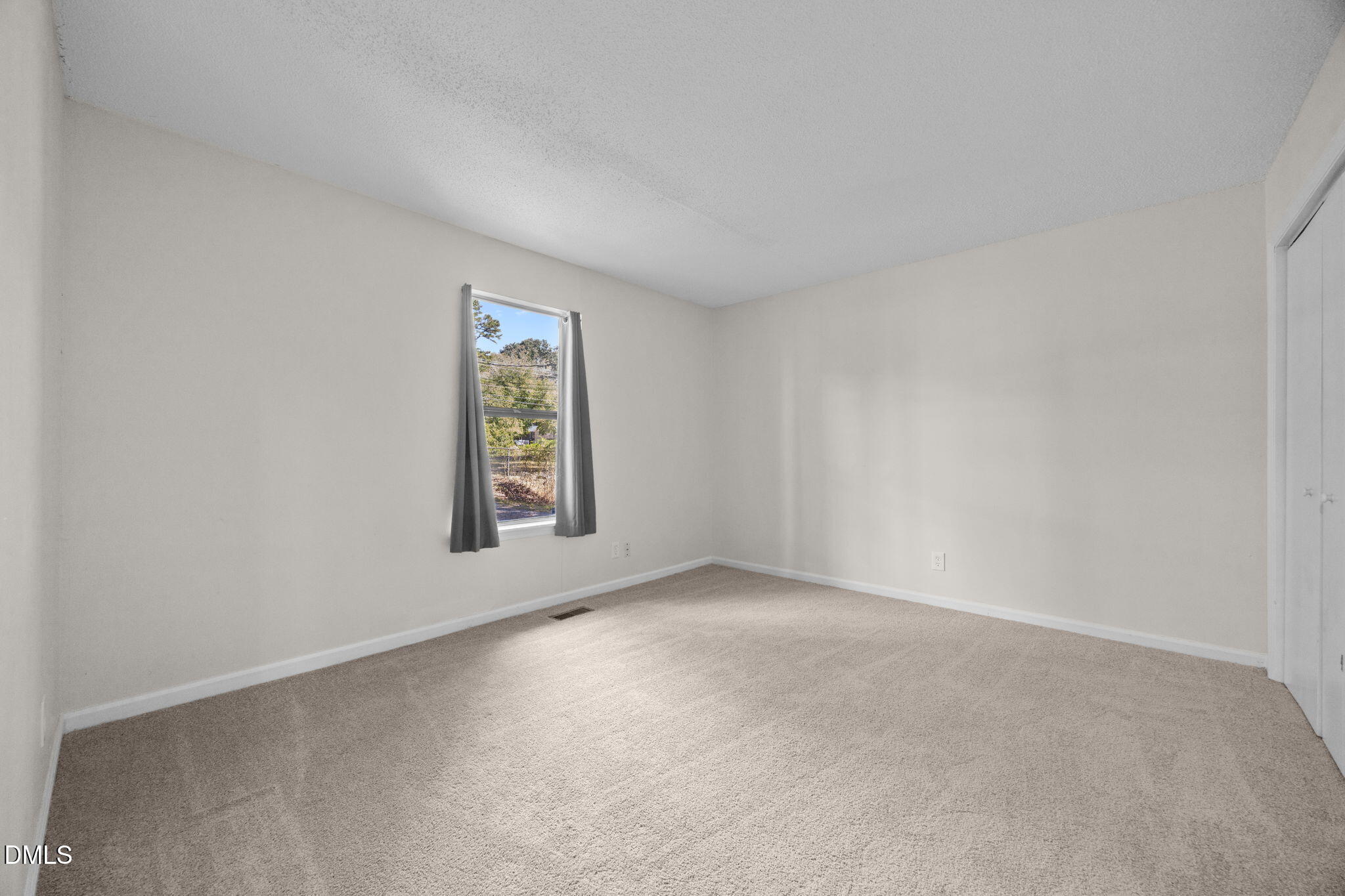 904 Snow Hill Road Durham, NC 27712 - Photo 32 of 41 an empty room with window