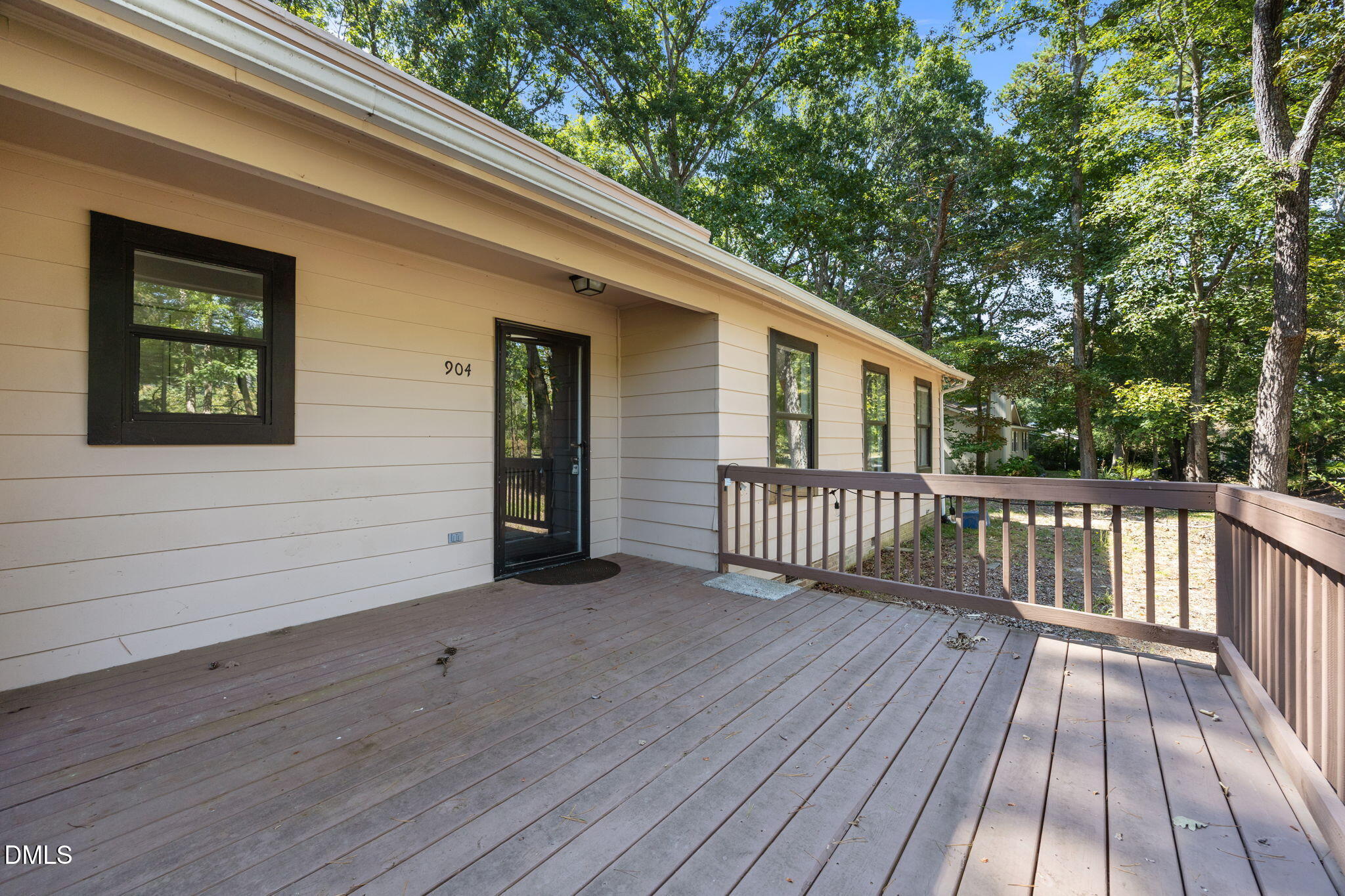 904 Snow Hill Road Durham, NC 27712 - Photo 6 of 41 a view of a house with wooden deck