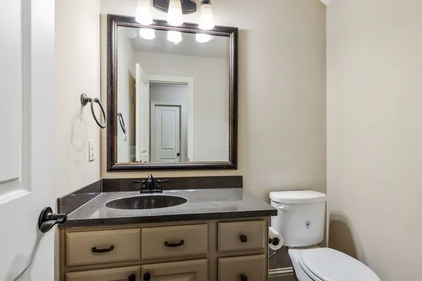 a bathroom with a sink and a toilet