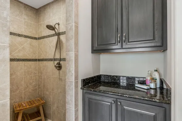 a kitchen with a sink and cabinets