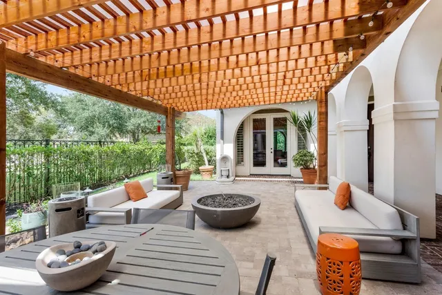 a view of a patio with furniture