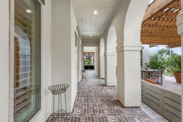 a view of a hallway with a white door