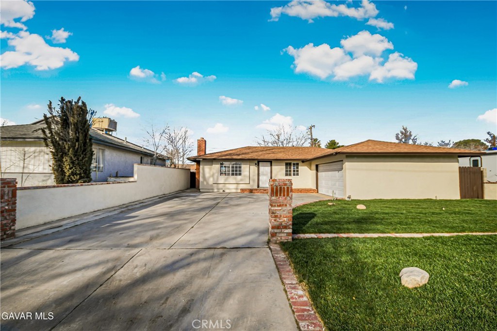 45503 11th Street West Lancaster, CA 93534 - Photo 1 of 37 a view of a house with a yard