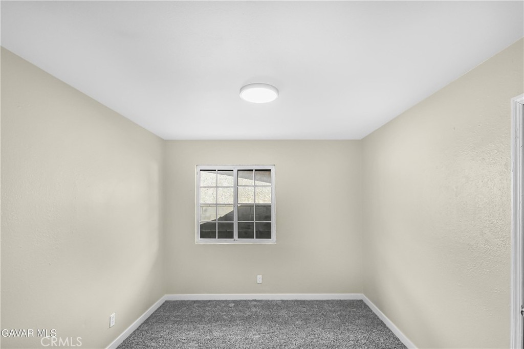 45503 11th Street West Lancaster, CA 93534 - Photo 19 of 37 an empty room with a window