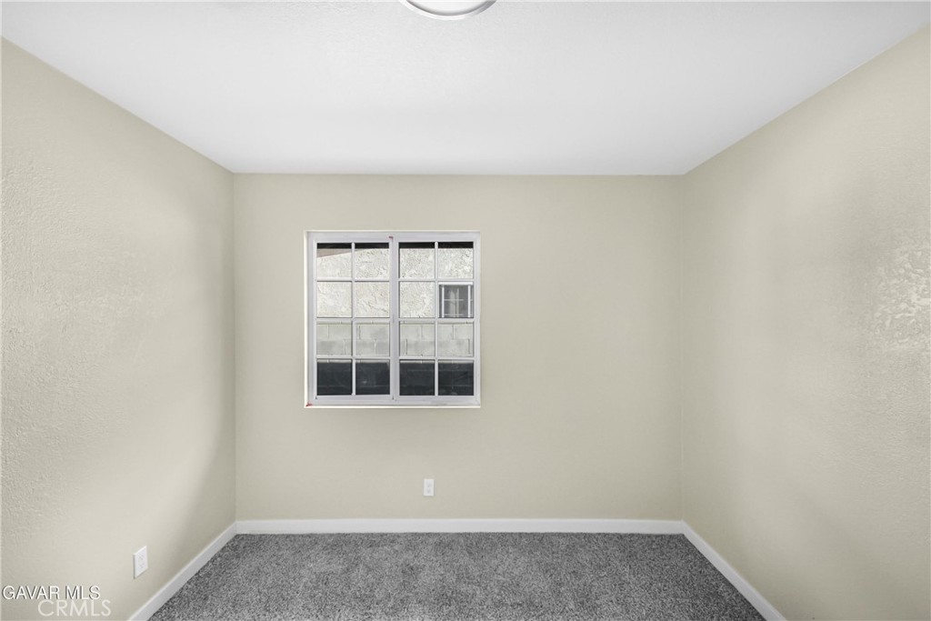 45503 11th Street West Lancaster, CA 93534 - Photo 21 of 37 a view of empty room with windows