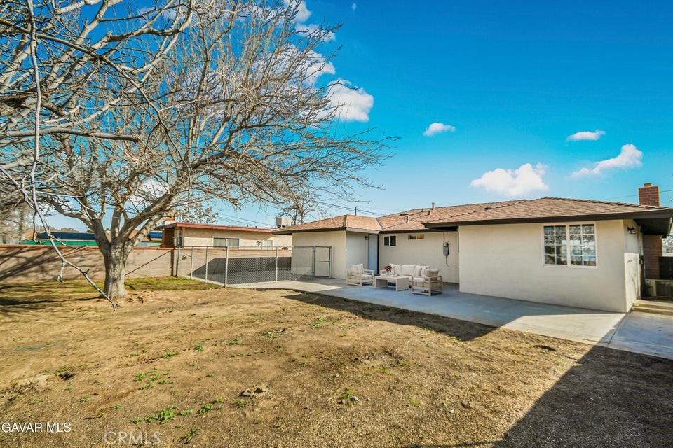 45503 11th Street West Lancaster, CA 93534 - Photo 34 of 37 front view of a house with a yard