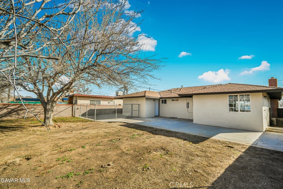 45503 11th Street West Lancaster, CA 93534 - Photo 35 of 37 a view of a house with a yard