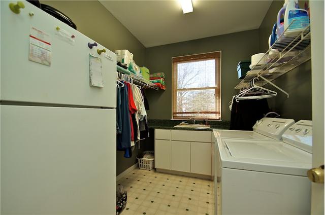 1125 Lewis Road Burns, TN 37029 - Photo 20 of 20 Utility room on mail level with sink and cabinets