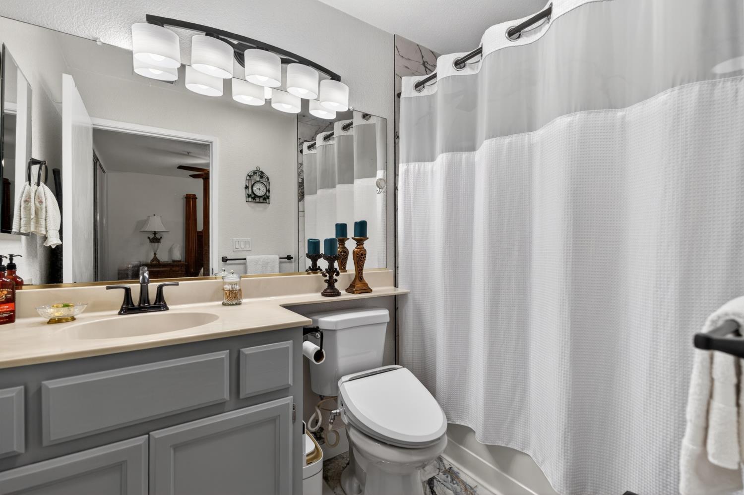 8020 Walerga Road, Unit 1140 Antelope, CA 95843 - Photo 26 of 37 a bathroom with a sink toilet and shower