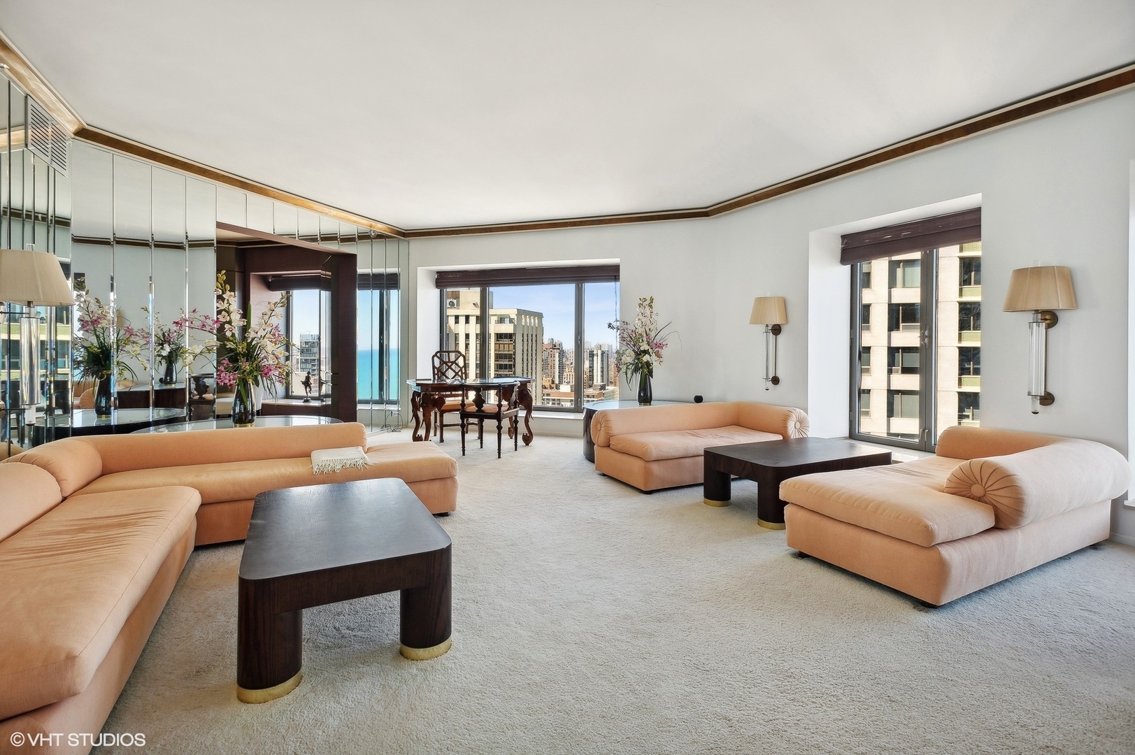 950 North Michigan Avenue, Unit 2203 Chicago, IL 60611 - Photo 9 of 26 a living room with furniture and a large window