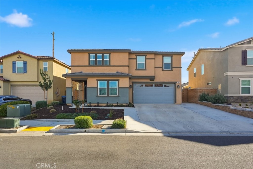 7608 Citrusmoon Court Riverside, CA 92507 - Photo 18 of 25 a view of a house with backyard and sitting area