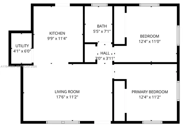 an aerial view of a house with a yard and garden