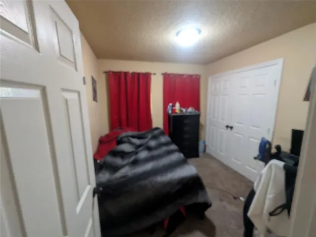 a room with furniture and a window