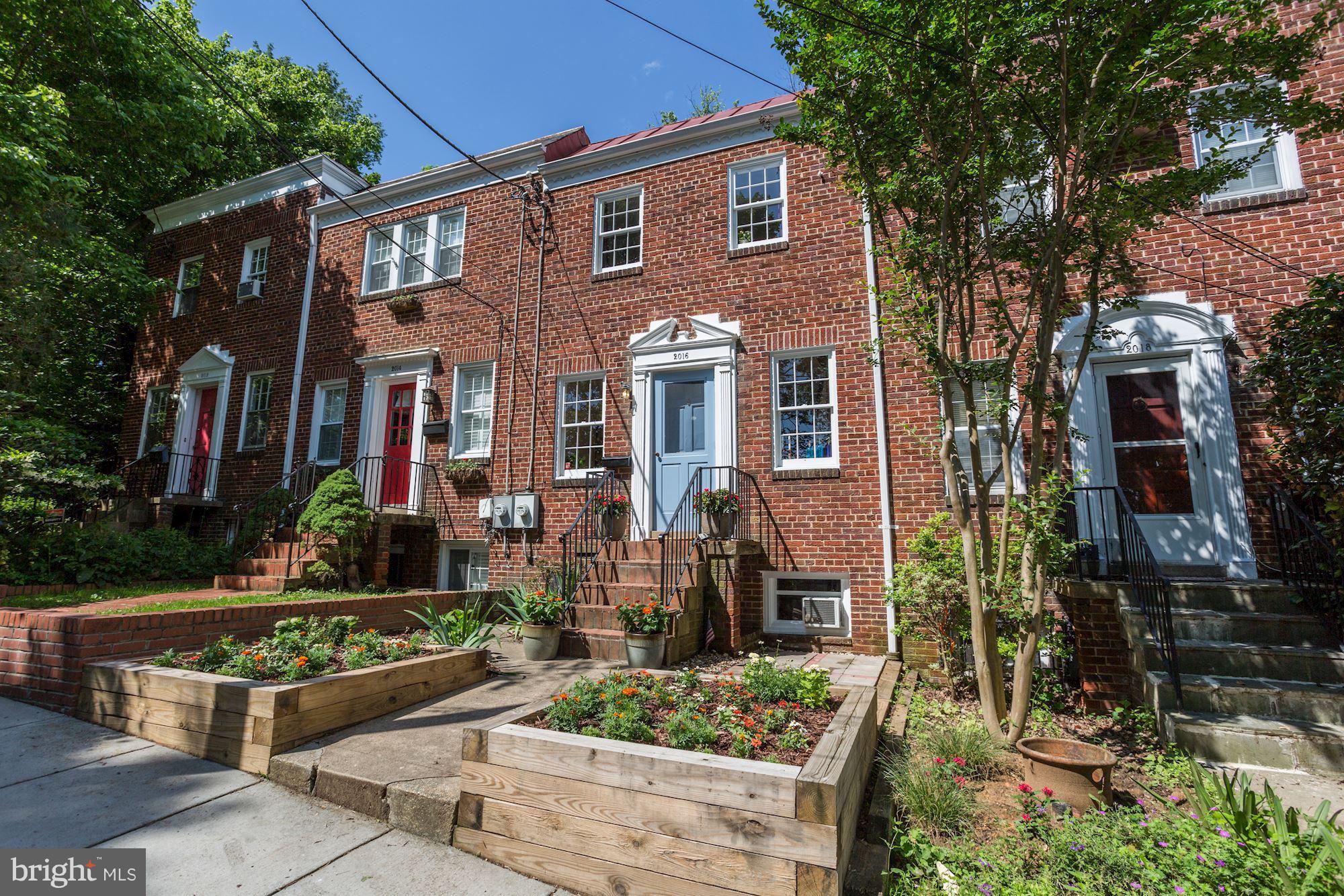 2016 Tunlaw Road Northwest Washington, DC 20007 - Photo 1 of 22 Flower beds on either side of entrance walk-way