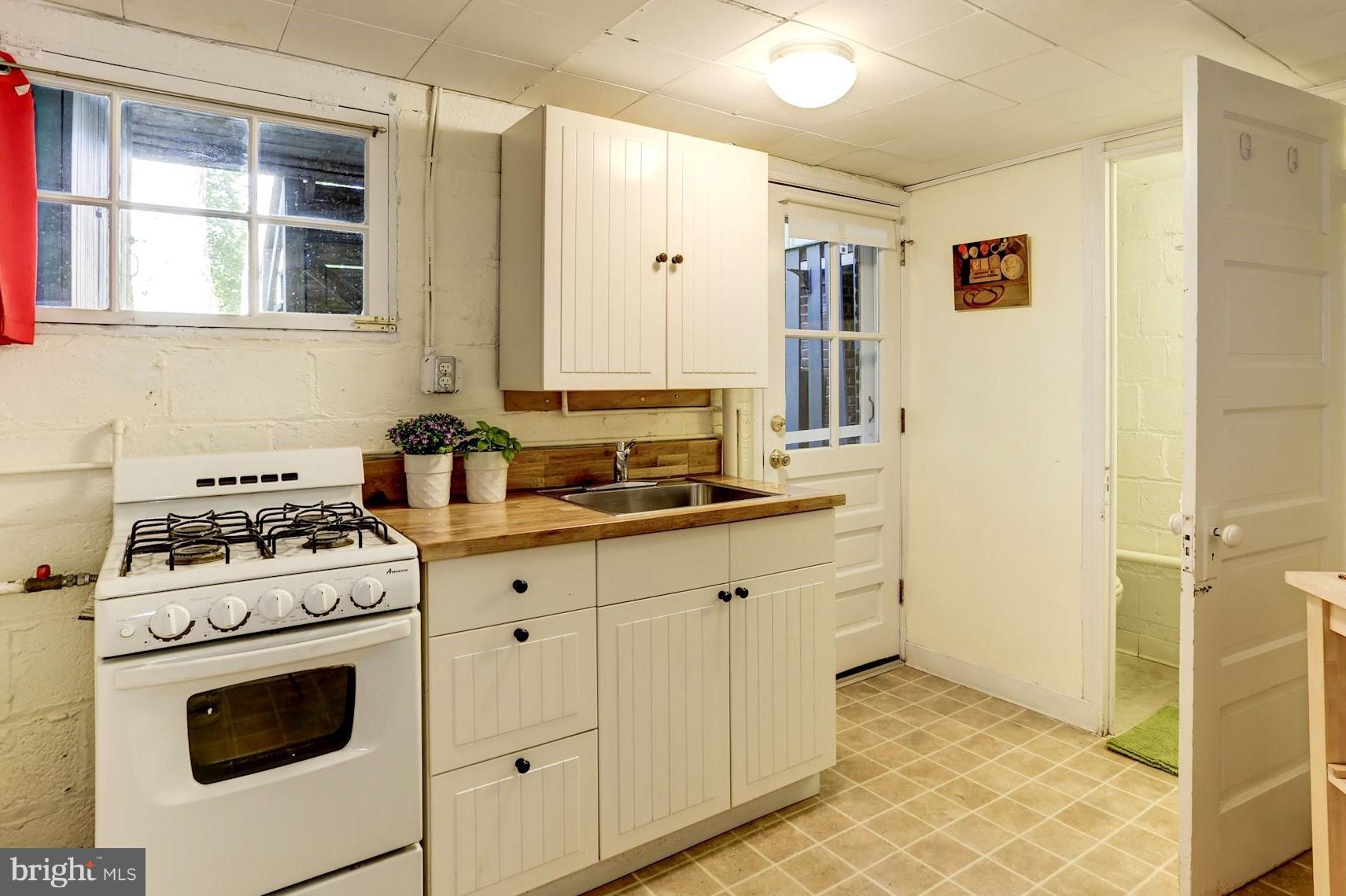 2016 Tunlaw Road Northwest Washington, DC 20007 - Photo 16 of 22 In-law Suite has it's own kitchen and full bath