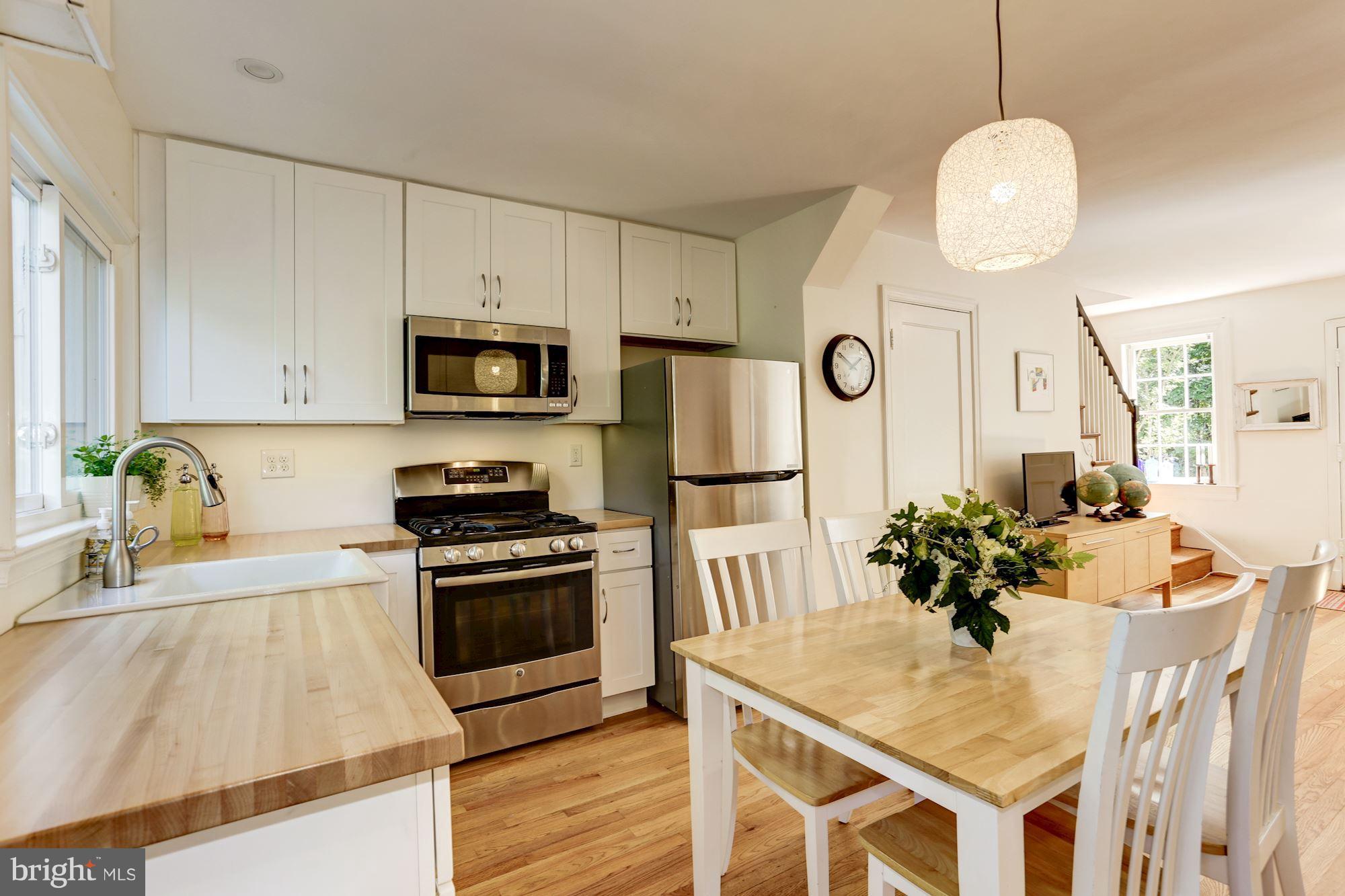 2016 Tunlaw Road Northwest Washington, DC 20007 - Photo 7 of 22 Kitchen Open and expanded w/new appliances