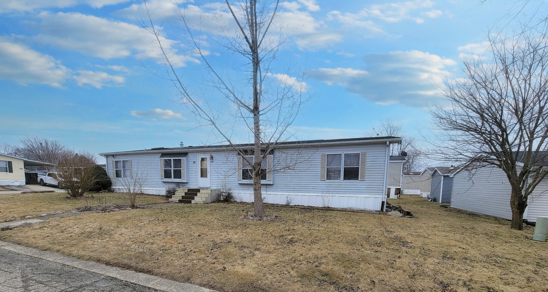 56 Cherry Lane Bourbonnais, IL 60914 - Photo 1 of 1 a view of a house with a backyard