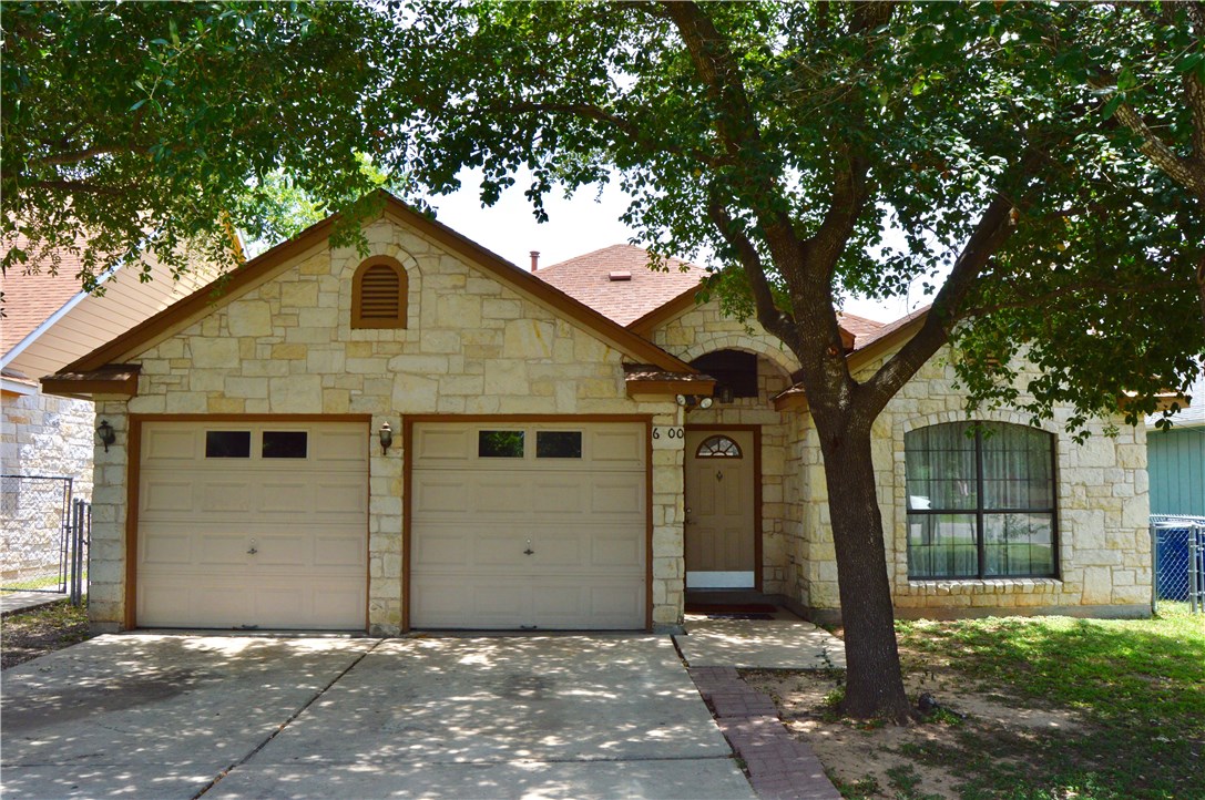 6400 Santos Street Austin, TX 78741 - Photo 1 of 1 a view of a house with a tree