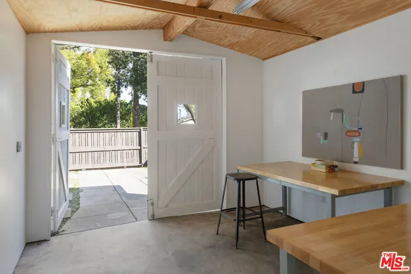 a room with furniture and window