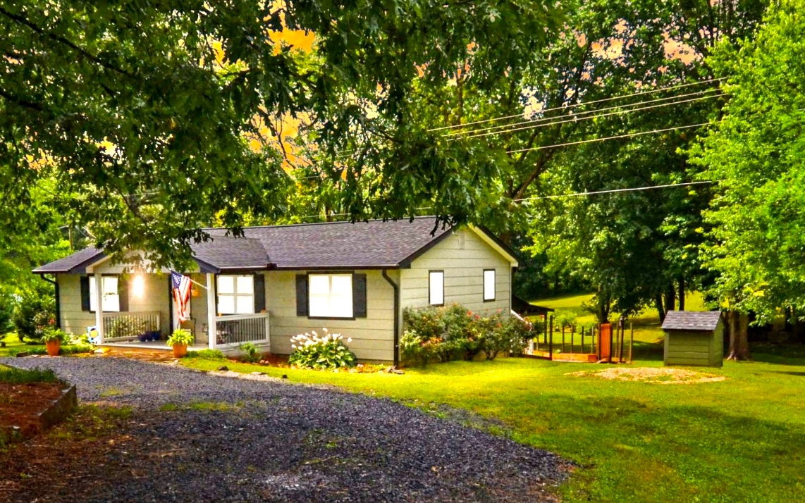 483 Parker Road Ellijay, GA 30536 - Photo 1 of 33 a front view of a house with a yard
