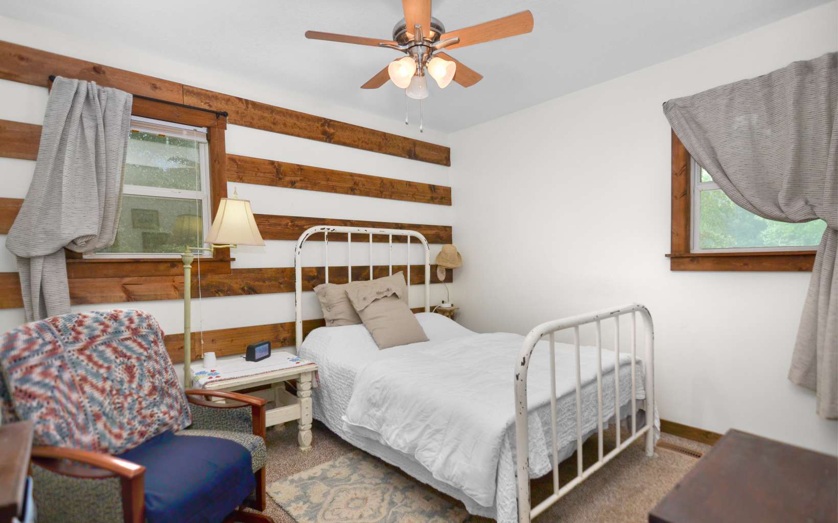 483 Parker Road Ellijay, GA 30536 - Photo 13 of 33 a bedroom with a bed couch and a window