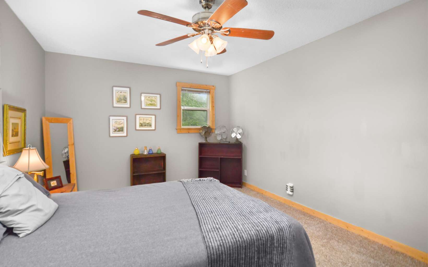 483 Parker Road Ellijay, GA 30536 - Photo 16 of 33 a bedroom with a bed and a chandelier