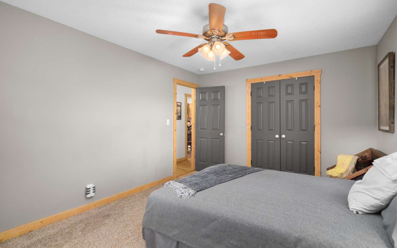 483 Parker Road Ellijay, GA 30536 - Photo 18 of 33 a bedroom with a bed and a chandelier