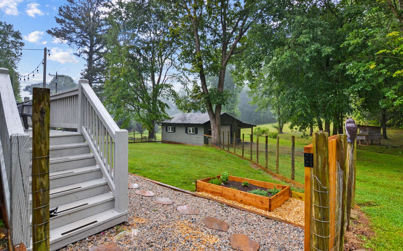 483 Parker Road Ellijay, GA 30536 - Photo 27 of 33 a view of a house with a yard