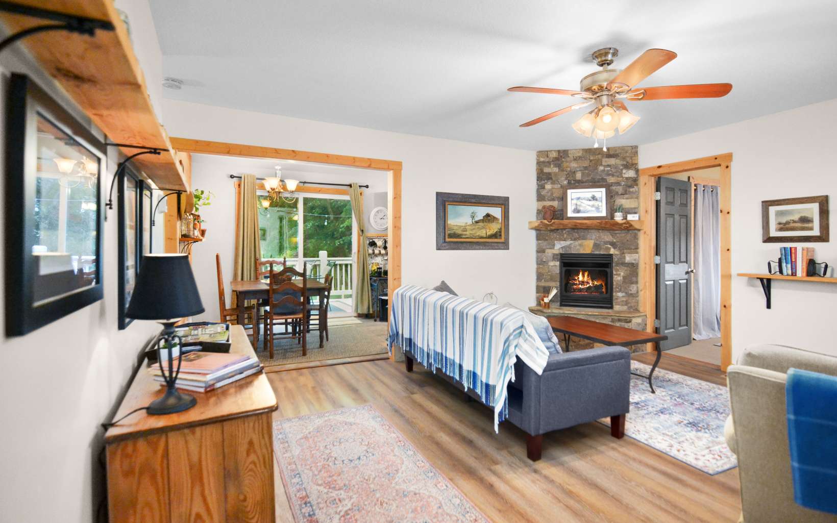 483 Parker Road Ellijay, GA 30536 - Photo 3 of 33 a living room with furniture fireplace and a flat screen tv