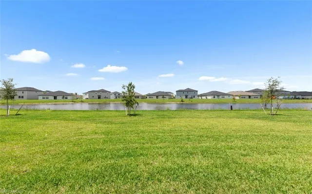 a view of an ocean and a houses