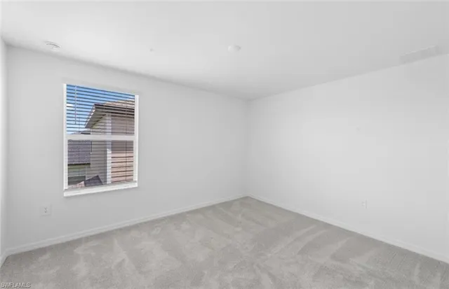 a bathroom with a double vanity sink a mirror and a bathtub
