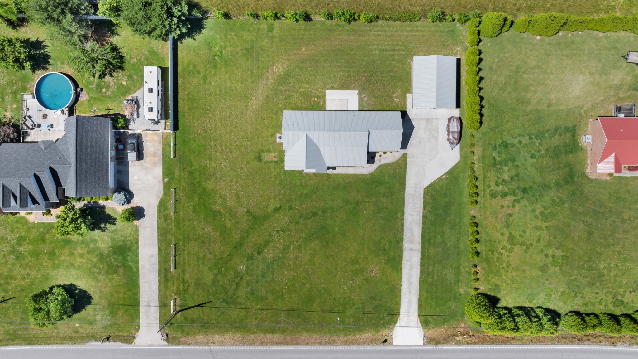 3896 Lynchburg Road Winchester, TN 37398 - Photo 54 of 57 an aerial view of a house with a yard