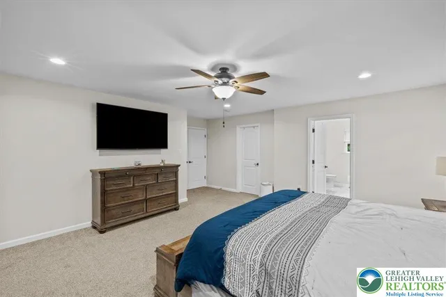 a bathroom with a sink double vanity granite tub and shower