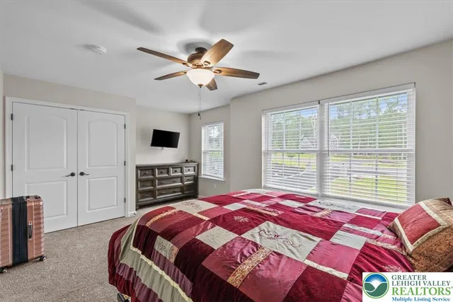 a view of a storage & utility room with a window