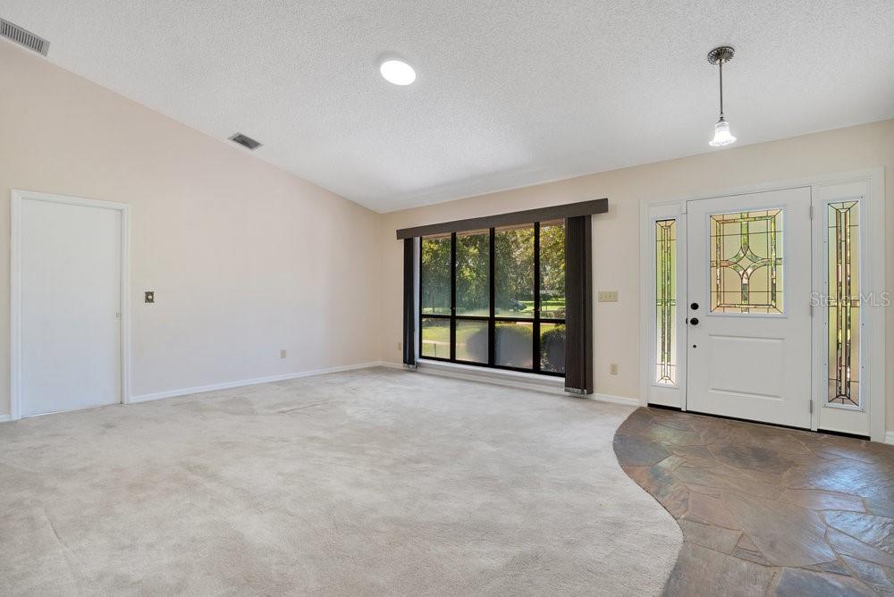 2088 Golden Arm Road Deltona, FL 32738 - Photo 11 of 51 a view of an empty room with a window