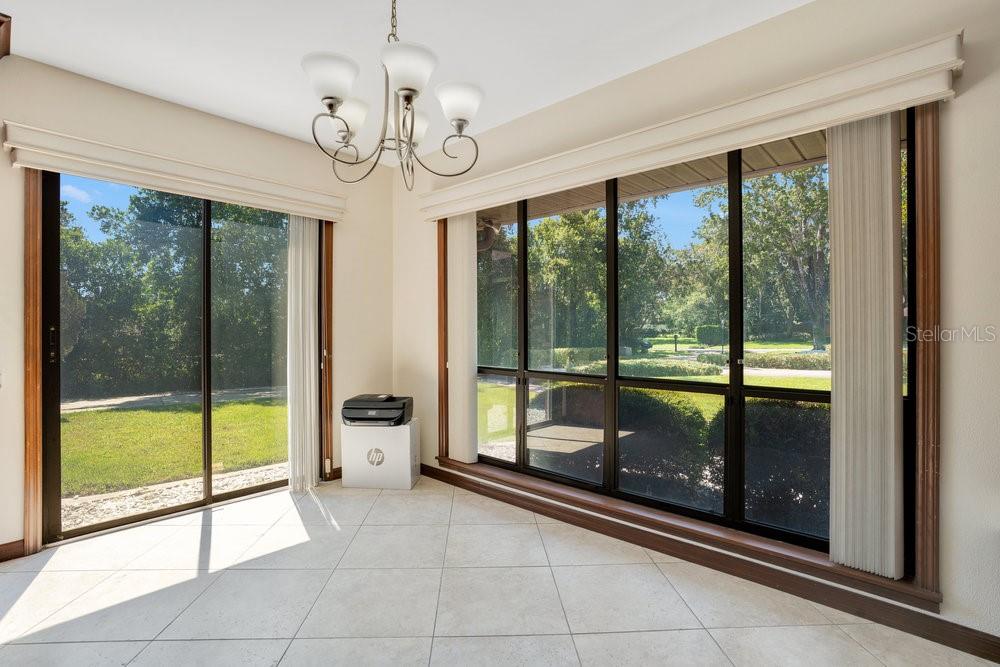 2088 Golden Arm Road Deltona, FL 32738 - Photo 17 of 51 a view of an entryway with a chandelier