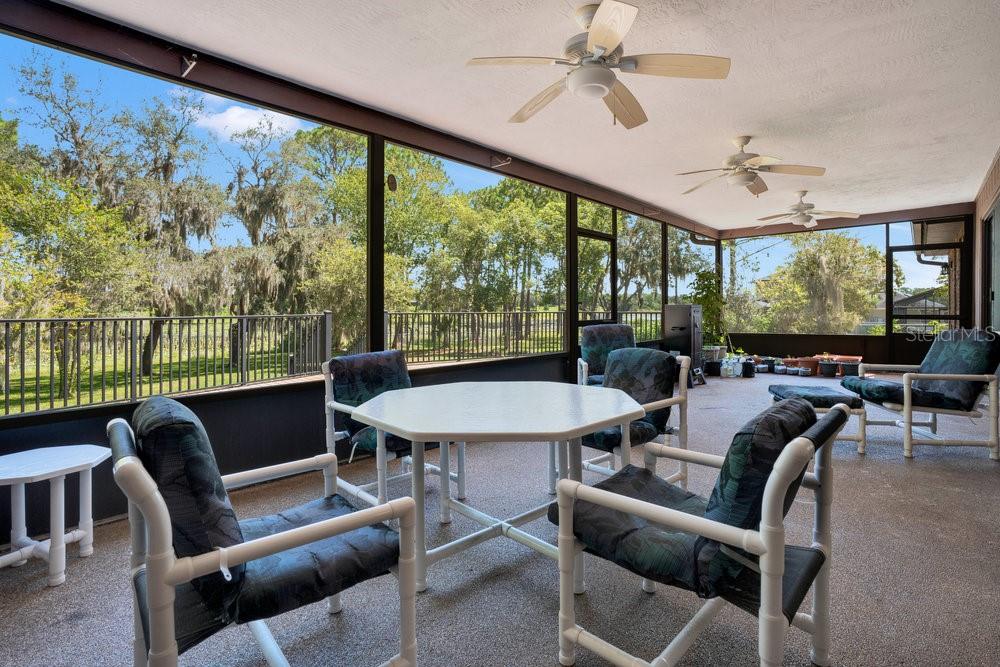 2088 Golden Arm Road Deltona, FL 32738 - Photo 32 of 51 a view of a dining room with furniture window and outside view