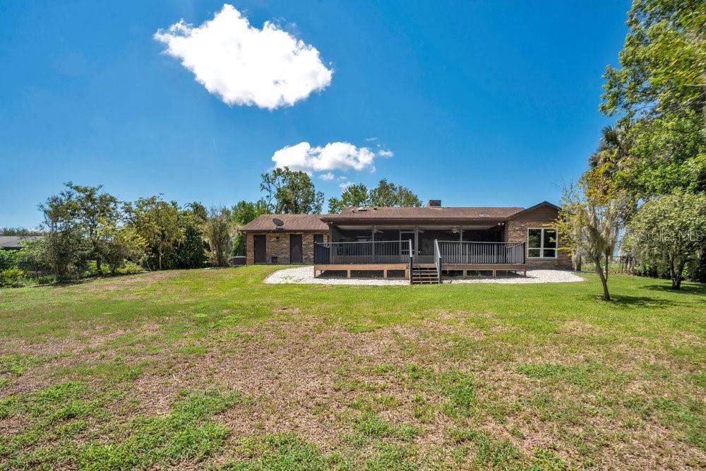 2088 Golden Arm Road Deltona, FL 32738 - Photo 33 of 51 a view of a house with a big yard