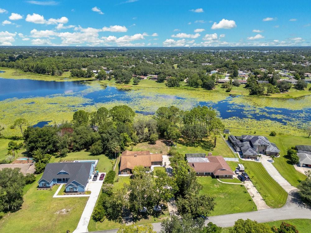 2088 Golden Arm Road Deltona, FL 32738 - Photo 44 of 51 an aerial view of residential houses with outdoor space
