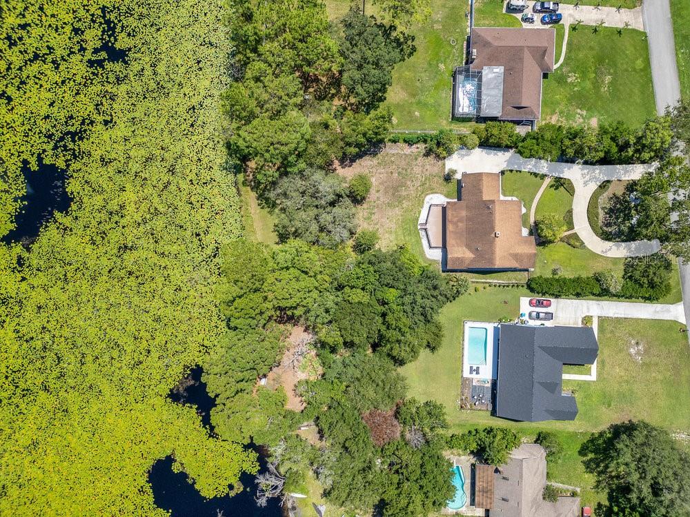 2088 Golden Arm Road Deltona, FL 32738 - Photo 46 of 51 an aerial view of a house with yard swimming pool and outdoor seating