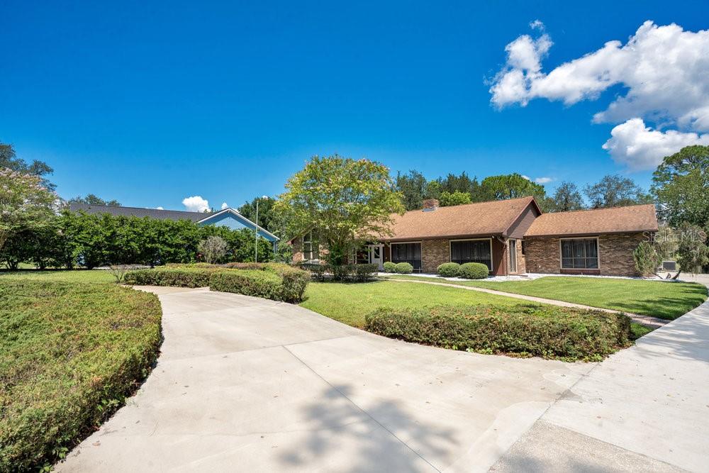 2088 Golden Arm Road Deltona, FL 32738 - Photo 5 of 51 a view of a house with a yard