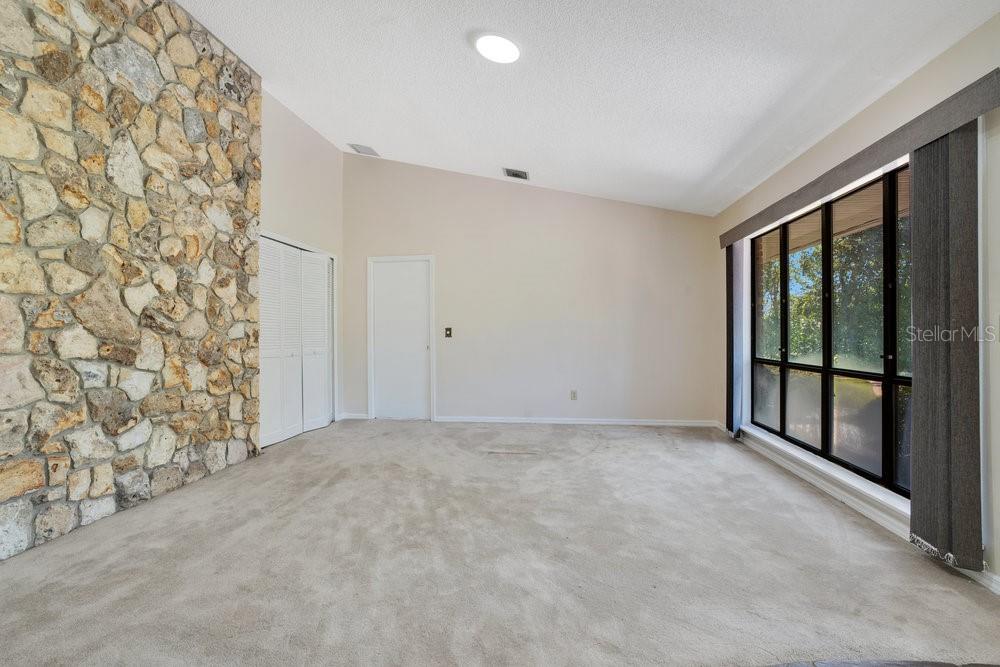2088 Golden Arm Road Deltona, FL 32738 - Photo 10 of 51 a view of an empty room with a window