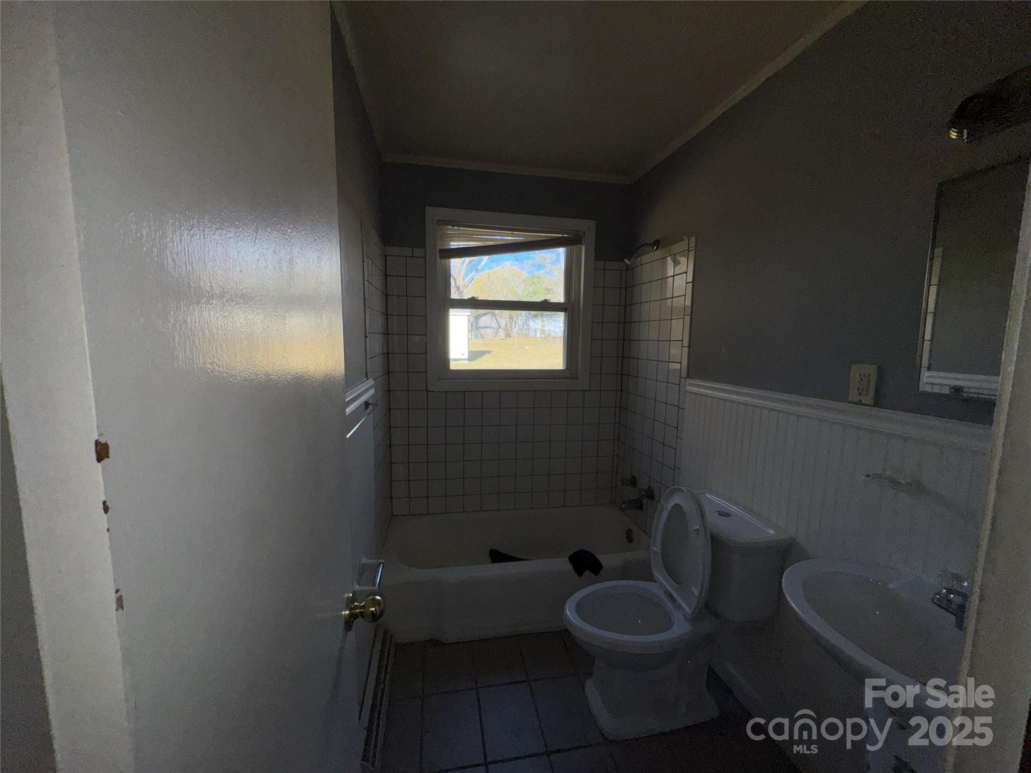 2724 Mary Avenue Gastonia, NC 28052 - Photo 17 of 21 a bathroom with a toilet and a sink